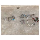 collection of charm bracelets from Tiffany & CoSPORTING GOODS