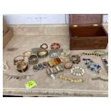 Antique jewelry box with bracelets and watchesBrand new metal watering can