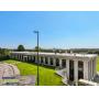 Sealed Bid Auction: Iconic 22,500 Sq. Ft. Greek Parthenon Style Building at the Gateway to Cadillac, MI